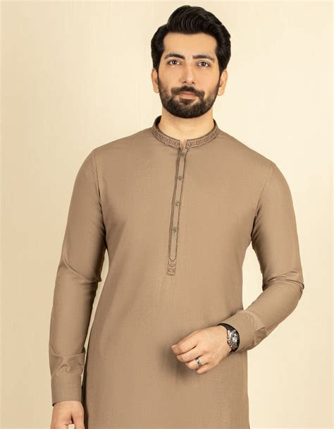 light brown shalwar kameez.